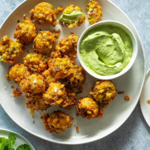 Corn, Jalapeño & Chorizo Fritters w Zingy Avo Sauce